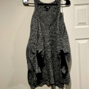Ladies sweater with cut out on the shoulders